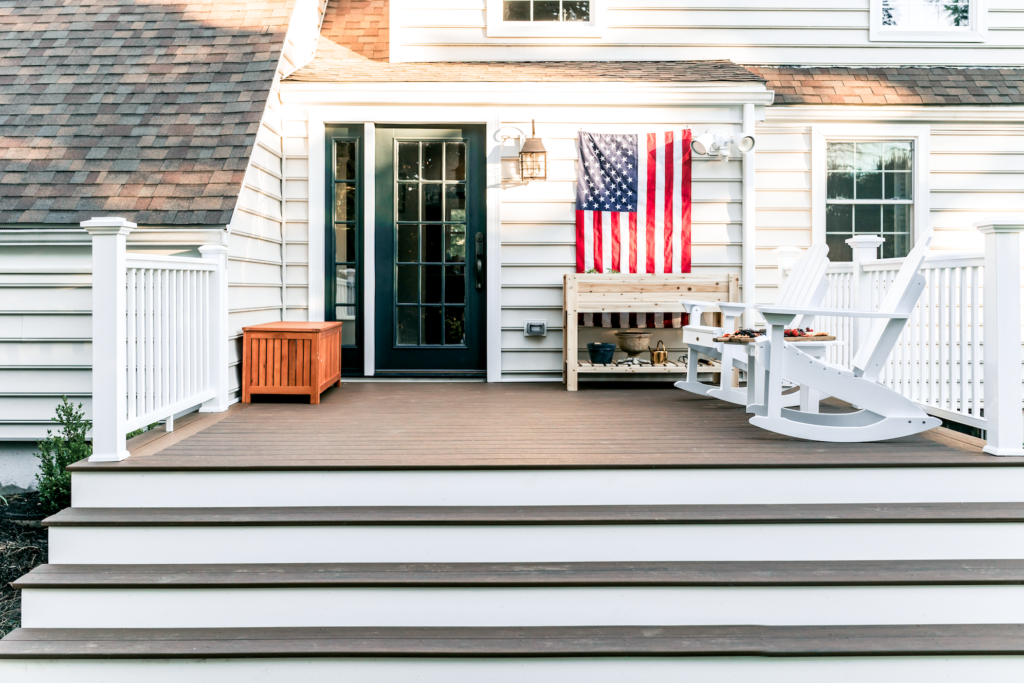 New England Timbertech Deck With Rocking Adirondack Chairs | The Coastal Confidence